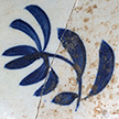Pearlware painted underglaze common shape cup with floral motif. Below left is photograph of interior rim of cup. 3.75” cup rim diameter; 2.5” cup height.